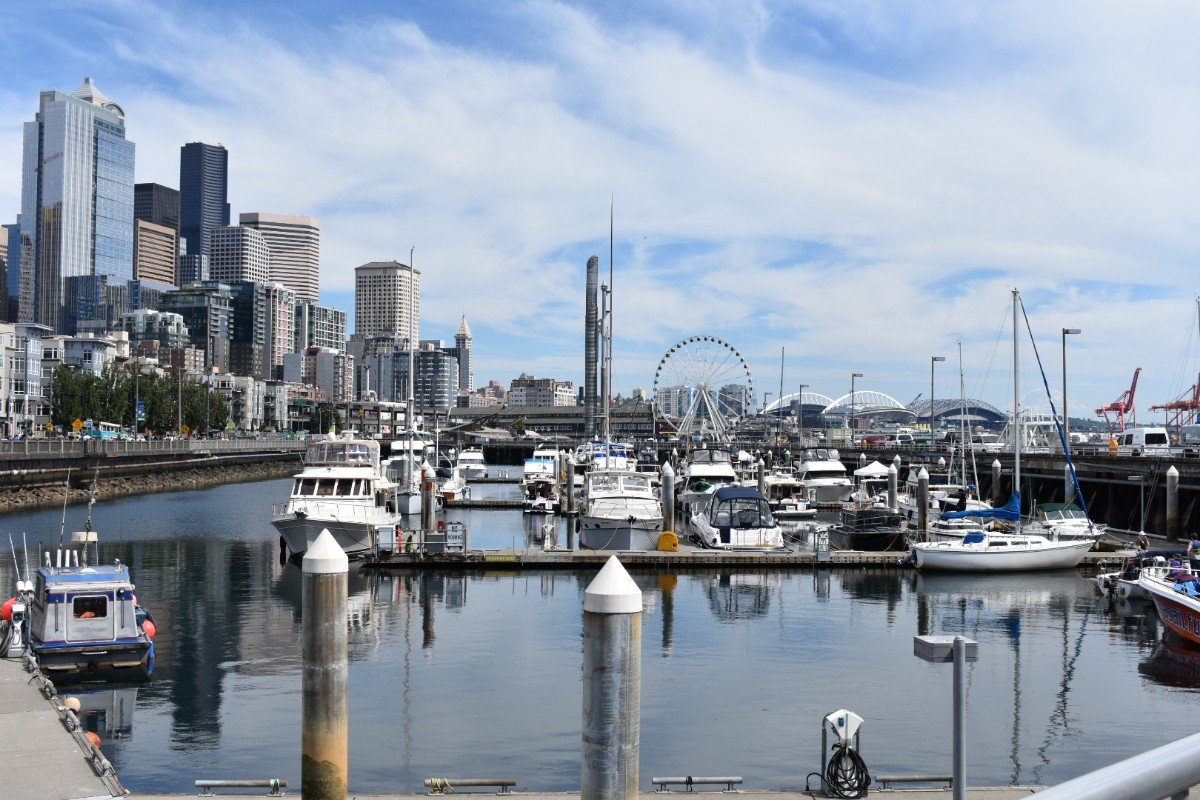 View of the Seattle Waterfront from the marina with the Seattle Great Wheel in the background