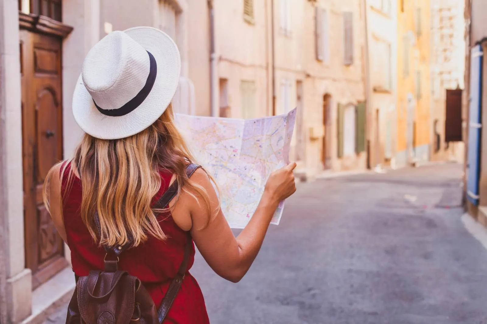 women traveling solo with a map