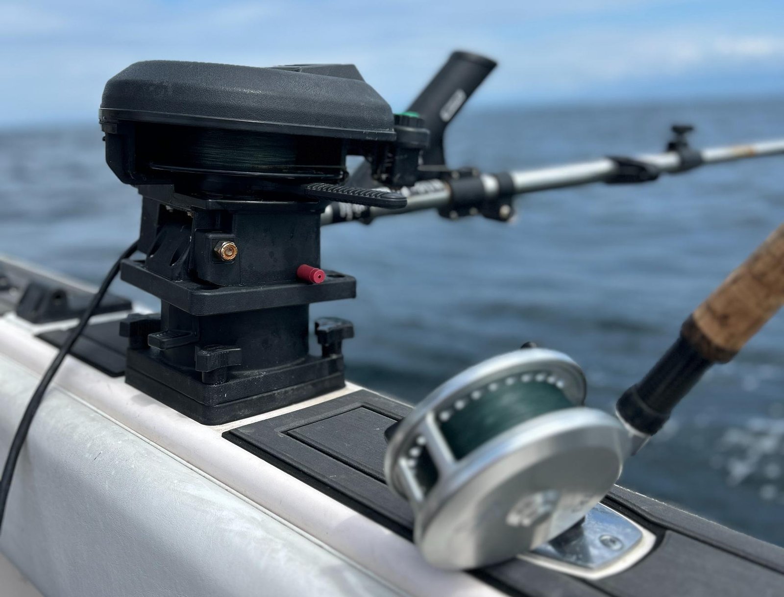 “Coastal Wilderness Adventures fishing gear on the ocean